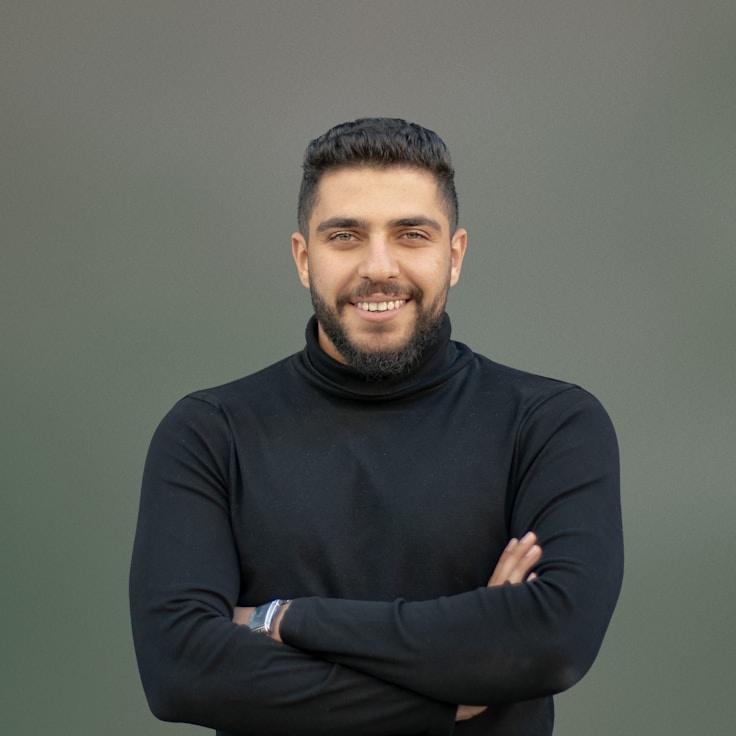 Kaveri Mehta, Lead Design Curator at HollowOasisStarlit, reviewing corporate floral arrangements